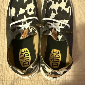 Hey Dude Women’s Cow-Print Slip-On’s